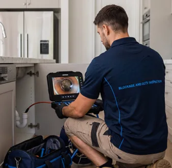 Clearing a blocked sink at a Abbotsford property
